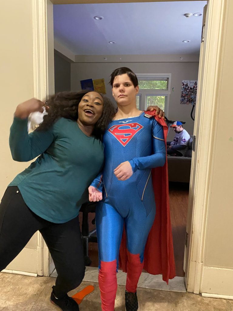 People pose in Halloween costumes