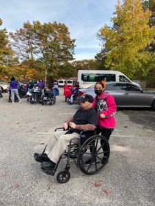 People supported getting ready for the tee ball game