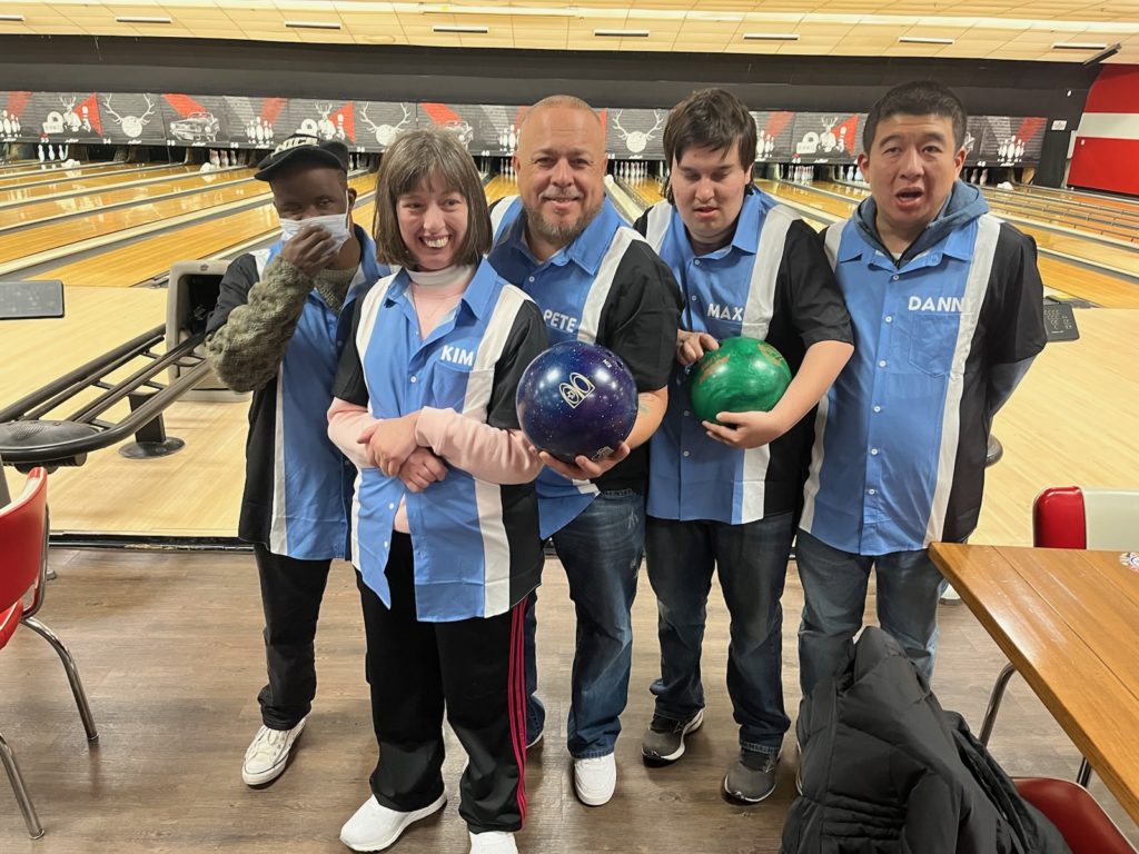 People supported enjoying the bowling alley
