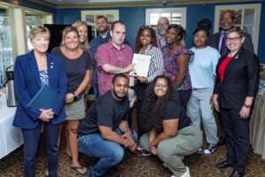 William Street staff including DSPs post for a photo with their citation.