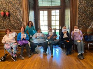 Self-advocates pose for a photo at the rights rally