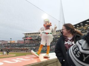 Syosset resident Lizzie and mascot Quacker Jack