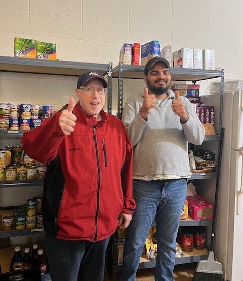 Samuel volunteering 3 | Citizens Options Unlimited Dean Davidson and Samuel Morales at the Trinity Lutheran Church Pantry in Glen Cove