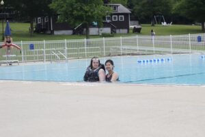 Campers enjoy the pool at Camp Loyaltown
