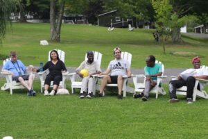 Camp Loyaltown campers relaxing outside