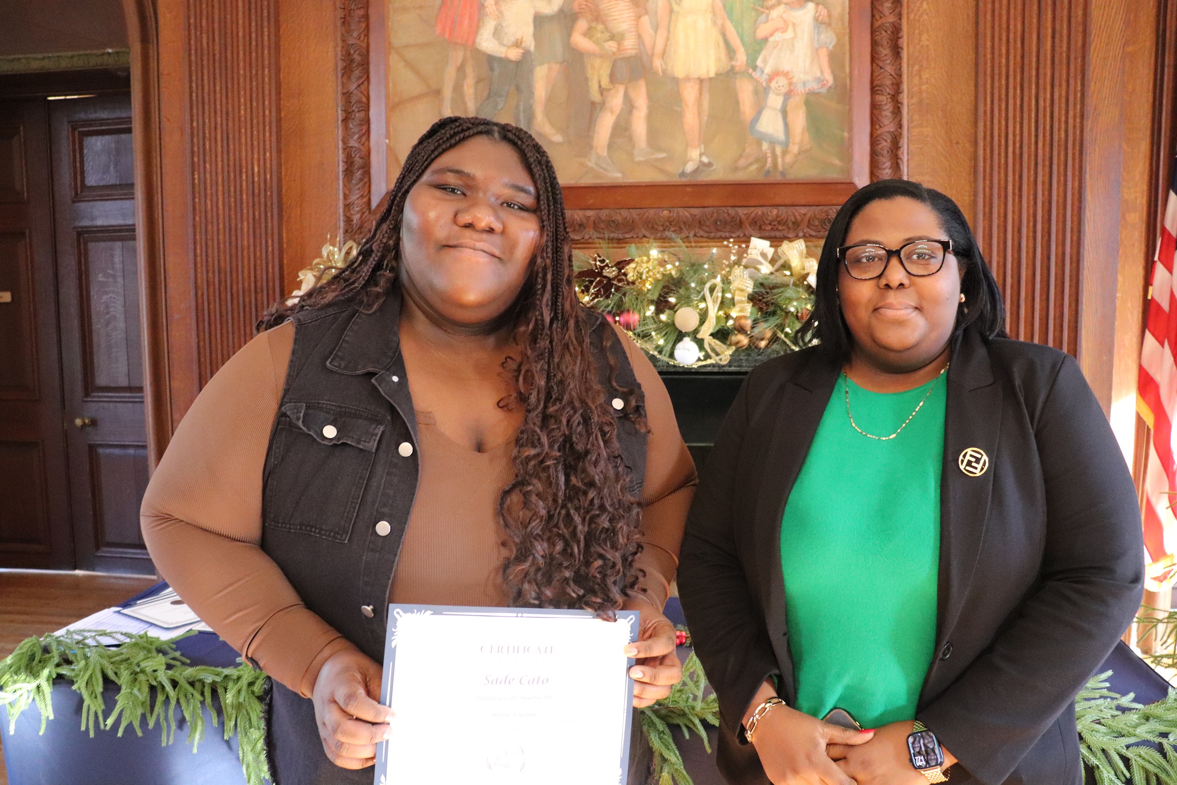 Sade Cato with her Employee of the Quarter recognition and house manager Doris Jean-Medelus