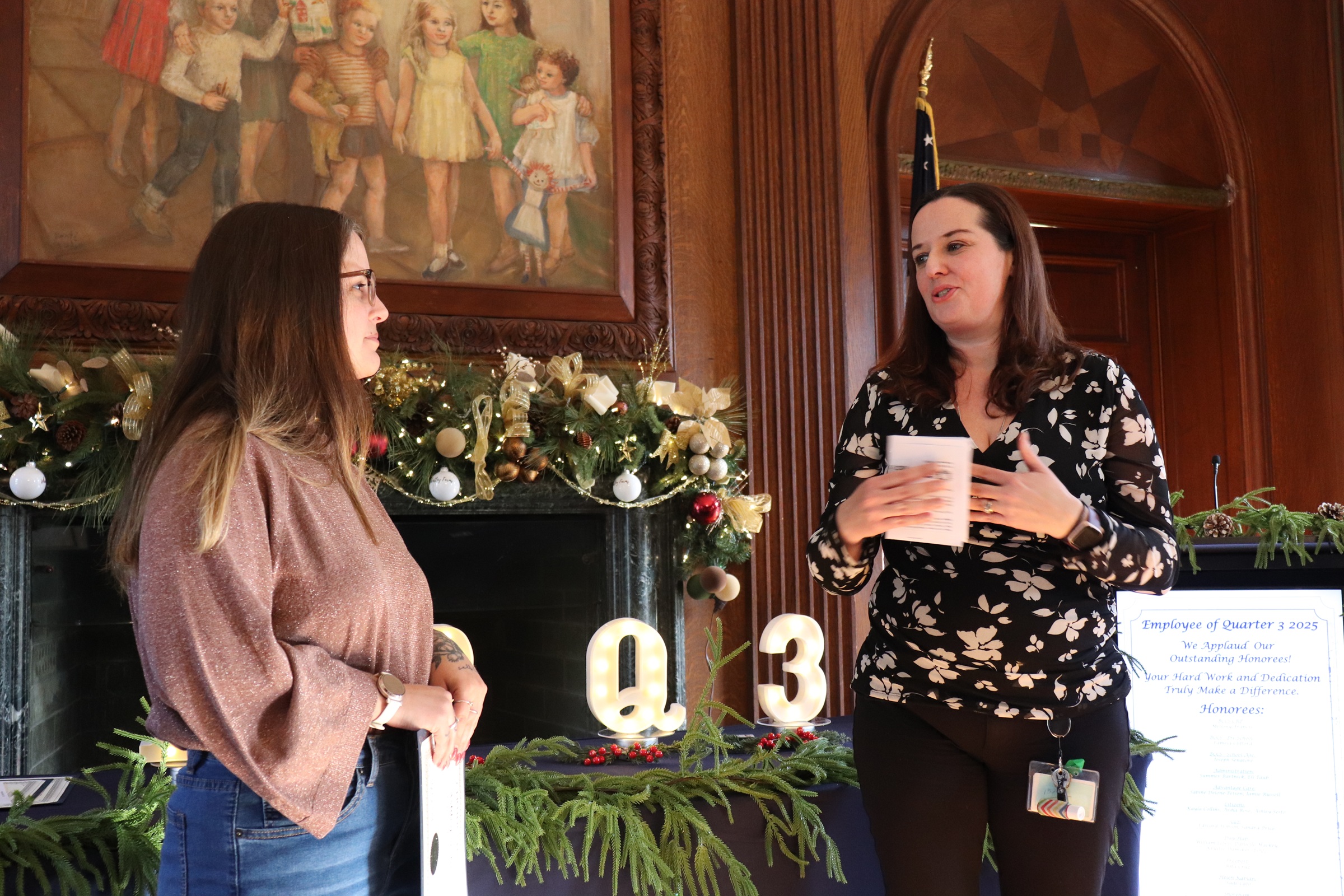 Ashley Sesto with her Employee of the Quarter award and Director of Behavioral Health Services Lauren Jaquay