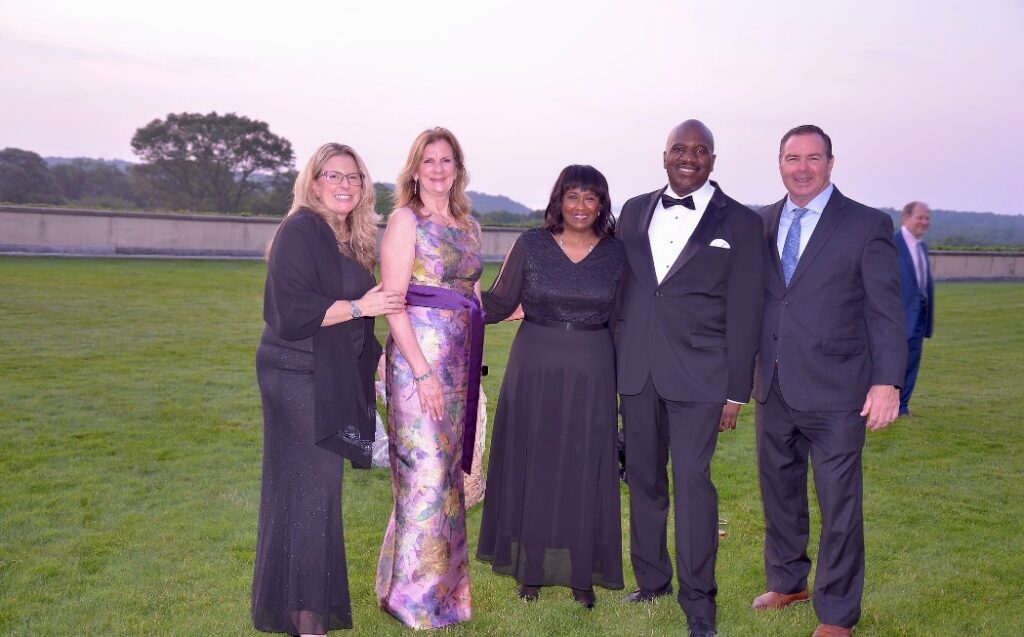 5 attendees enjoy the Rose Ball