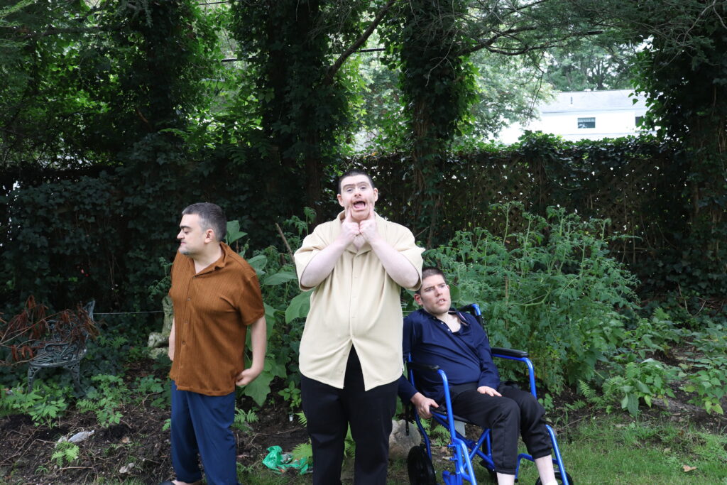 IMG_2119 | Citizens Options Unlimited Three Citizens residents stand in their garden.