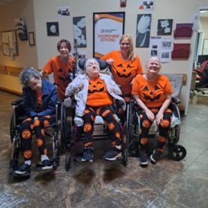 Citizens Shoreham ICF Dressed as Pumpkins for Halloween