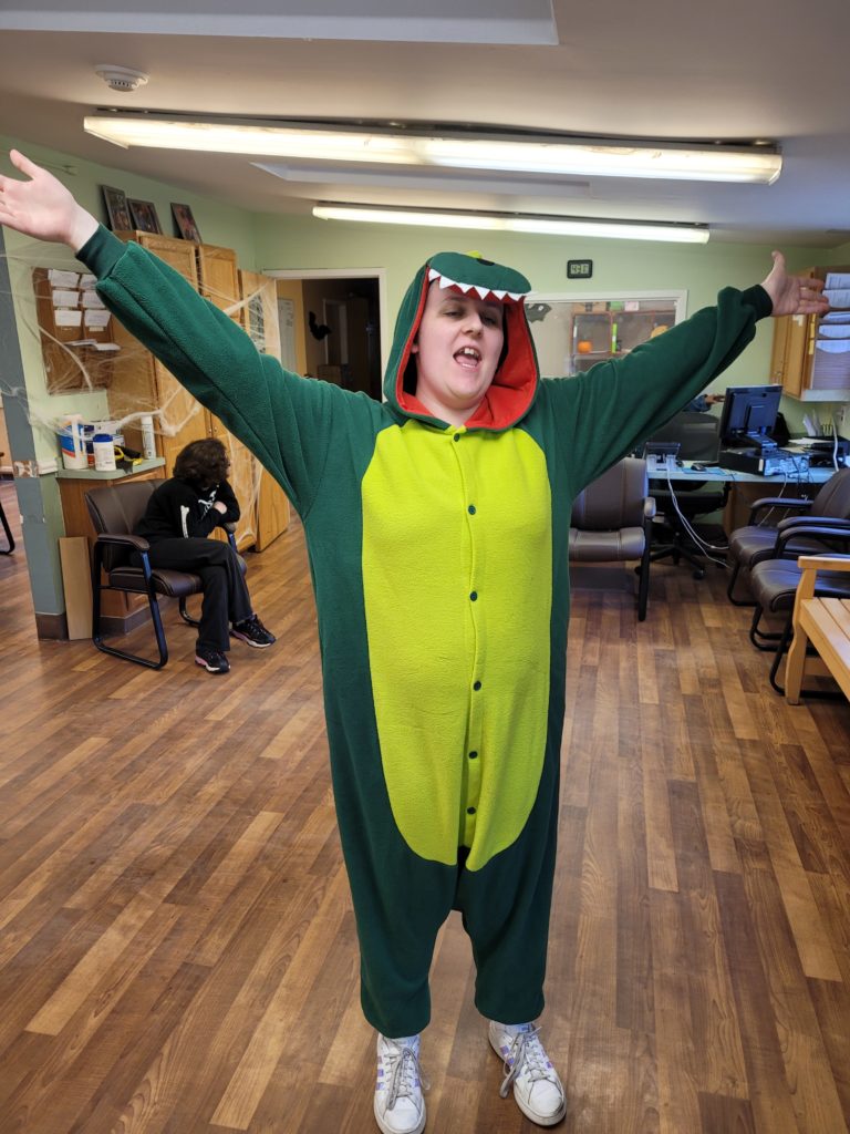 Man in Dinosaur Costume