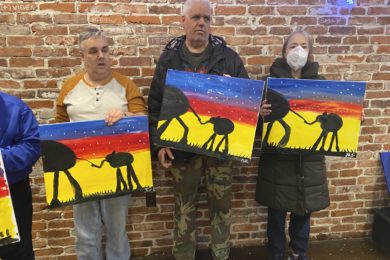 People supported showing off their paintings