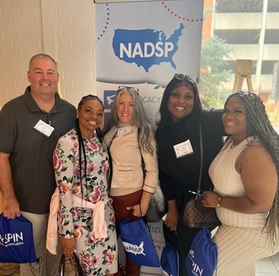Dapheney Henry poses with colleagues at the NADSP conference