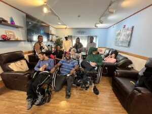 DSPs and residents pose together for a photo at Rainbow Commons