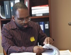 Fred Parnther studying for his vocational training course
