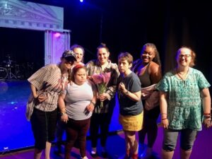 Tanya and her fellow theater performers pose for a photo