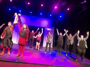 Tanya and her fellow theater performers take a bow