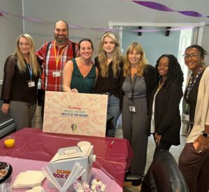 Krysta Fabian, center, with the Shoreham BIS team at her farewell party