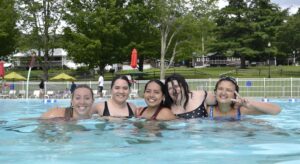 Camp Loyaltown campers and staff enjoy the pool