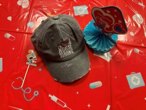 Photo of a baseball cap that reads "Nurse Strong"