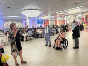 Lynne Brewer, event organizer, giving a speech at the June Jubilee