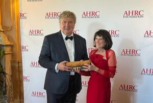 AHRC Foundation Board President Tom Rosicki with Leadership Award recipient, Camp Loyaltown Inc. President Linda Raff.