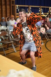 A camper dresses up for the Camp Loyaltown fashion show.