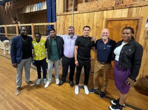 7 Camp Loyaltown staff members pose for a photo at Staff Appreciation Night.