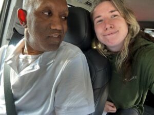 Andrea Sparks takes a selfie with a resident