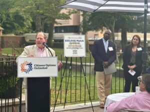 Mark Gamell speaks at the Camp Loyaltown reception