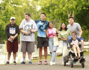 A group of campers and counselors enjoying Camp Loyaltown together