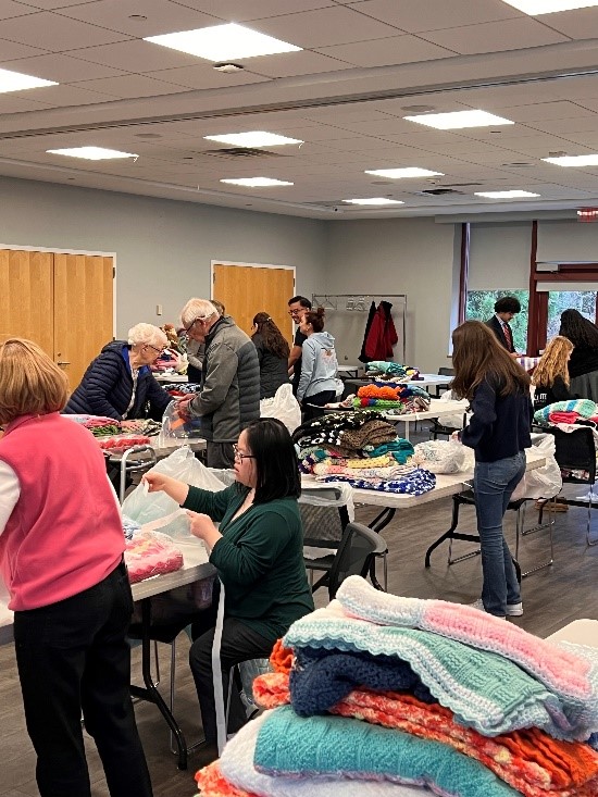 Volunteers collecting blankets