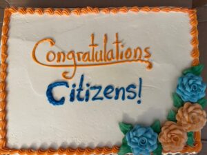 A cake reading "Congratulations Citizens!"