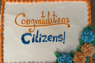 A cake reading "Congratulations Citizens!"