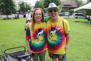 Self-advocate John Ginther and his mother at the PrideAbility Pride parade.