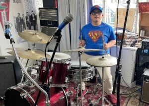 Just Azanero plays the drums as part of his self-direction services