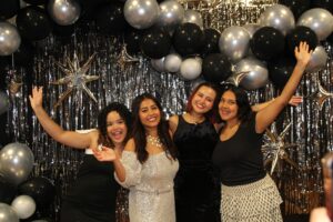 Four Camp Loyaltown staff members enjoy Staff Appreciation Night