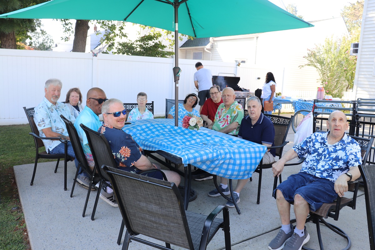 Residents and staff members at Ontario Avenue enjoy their annual summer barbecue.