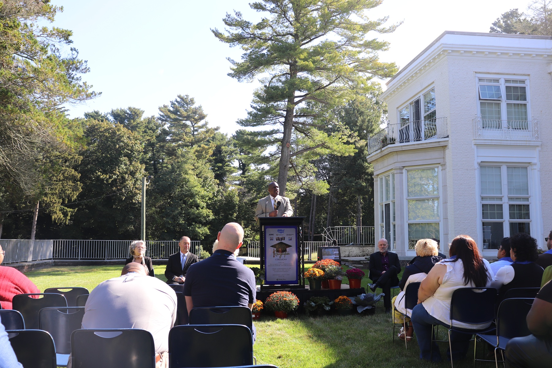 Citizens CEO Stanfort Perry speaks at the NADSP graduation.