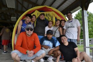 Ten campers and staff members enjoying Camp Loyaltown