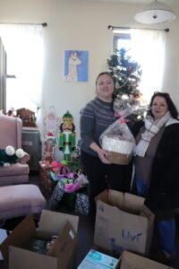 Helen Kaplan Center staff with gifts they donated to MOMMAS House.