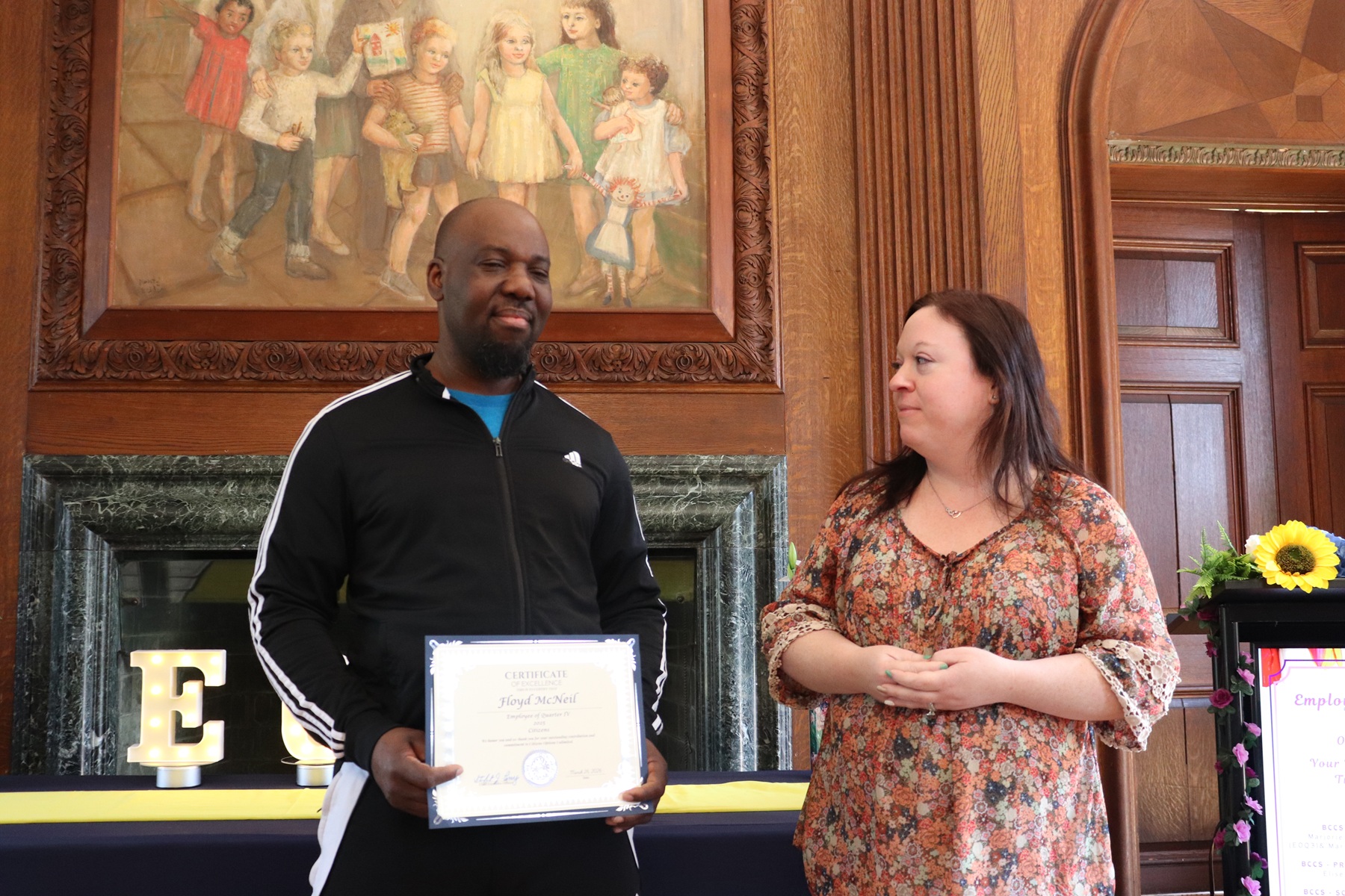 Floyd McNeil receives his Employee of the Quarter award