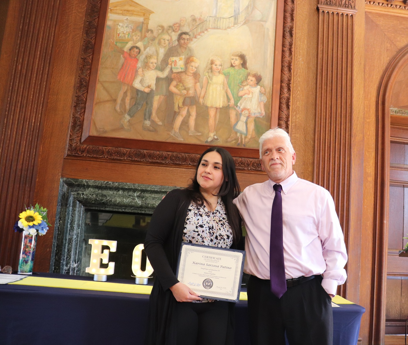 Karina Sarzosa Patino receives her Employee of the Quarter award